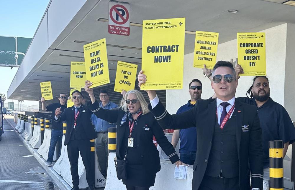 United Flight Attendants Picket For Improved Wages